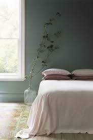 This is another bedroom with green walls that has gorgeous golden accents, but the color is a fabulous shade of pale sage instead of mint. Trending Sage Walls Exhibit One