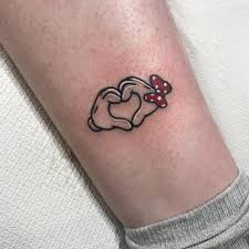 Image May Contain One Or More People Hand Tattoos Minnie Tattoo Mickey Tattoo