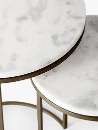 Ash solids and quartered white oak veneersinset round mirrored glass in center with stainless steel. West Elm Round Marble Nesting Side Table White Burnished Bronze At John Lewis Partners