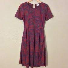 Bright violet (bluish purple) color with a soft neon green paisley floral print. Lularoe Dresses Lularoe Amelia Dress Floral Pattern Fit Flare Poshmark