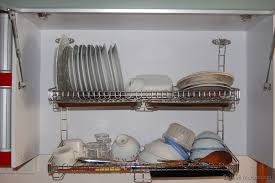 Dish Rack Placed Above The Sink And Part Of The Kitchen Cabinet It Usually Has A Flip Up Cover Which Will Dish Rack Drying Red Kitchen Cabinets Dish Drainers