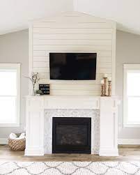 modern farmhouse styled fireplace with shiplap instagram brittneysteenhoek farmhouse fireplace farmhouse fireplace ideas fireplace design
