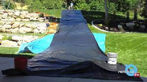 The main form is a plastic sheet and a method of wetting it; How To Make A Backyard Slip N Slide Youtube