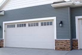 Maybe you would like to learn more about one of these? Madison Window Inserts In Almond Carriage Style Garage Doors In Downs In Carlson Exteriors Inc