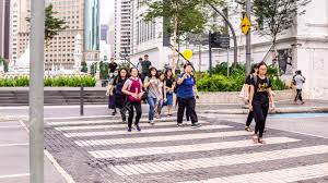 A zebra crossing is a type of pedestrian crossing used in many places around the world. Pedestrian Crossing The Road On The Zebra Line At The Kuala Lumpur Street During The Day Stock Photo Picture And Royalty Free Image Image 145015705