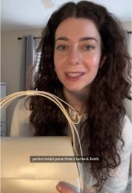 Bow Buckle Chain Top Handle Bag Charles and Keith