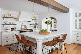 Whether you choose a dark charcoal grey or a lighter grey, mixing white upper cabinets and lower grey cabinets can work for any kitchen layout. 50 Best White Kitchen Design Ideas