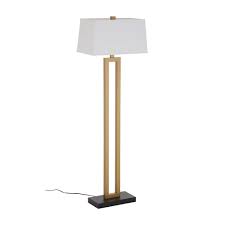 Crafted with a warm brass gold finish, its paired with a white globe shade for a luminous glow. Gold White Keeley Floor Lamp Glam Lighting