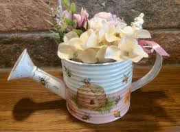 Ditch the traditional plastic watering can for something that's both functional and stylish with these unique, decorative watering cans and pitchers for indoor and outdoor plants. Metal Watering Can Decorative Watering Can Watering Can Etsy In 2020 Metal Watering Can Alice In Wonderland Gifts Watering Can