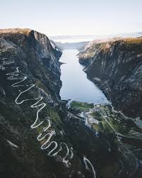 Its northern side is a massive cliff, plunging 984 metres (3,228 ft) almost straight down to fjord, a sight which attracts many visitors. Pin On Miscya