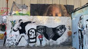 Banksy, an engaged artist in july 2005, banksy realized 9 paintings on the separation wall between israel and palestine. West Bank Palestine Barrier Separation Wall Graffiti Including Some Works By Banksy Youtube