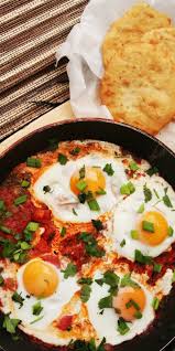 Egg Rougaille Is A Mauritian Inspired Dish Essentially A One Pan Dish Of Eggs Softly Poached In A Spicy Cre Delicious Breakfast Recipes Brunch Recipes Recipes