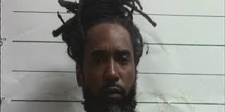 Father arrested for killing son's accused murderer, police say