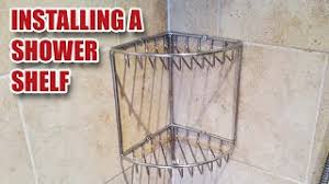 Apply a thin line of caulk around the soap holder to keep water from seeping behind the holder and surrounding tiles on the shower wall. How To Replace A Shower Shelf On A Tiled Wall Youtube