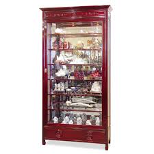 The cabinet is fabricated with a wood frame beveled glass hinged door which opens to reveal a mirrored back and shelved interior. Rosewood Grand Curio Cabinet Curio Cabinet Beveled Glass Doors How To Clean Furniture