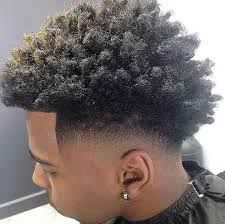 Black men often opt for a high fade haircut, featuring complete disappearing of hair much higher than the natural lines of hair growth at the temples and back of the head. 40 Fade Haircuts For Black Men