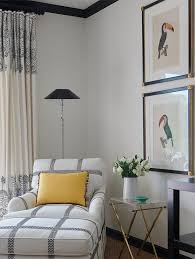 Blending a blue sofa into an existing living room, den or recreation area is simple. Yellow Pillow On Blue Sofa Transitional Living Room