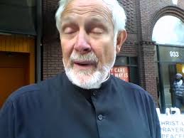 Catholic Priest with gift of healing helps weeping woman outside of Planned  Parenthood Pittsburgh