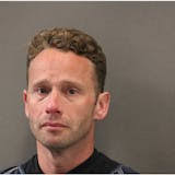 Lobbyist charged with threat to bring gun to MN Capitol