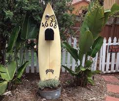 Mumbai artist retreat is a cabin built from steel and bamboo by indian studio architecture brio in the coastal town of alibag that's raised on stilts to withstand rising sea levels. Use Your Old Surfboard To Display A Mailbox Place It Into A Planter Write Your House Numbers And Attach The Bo Tropical Mailboxes Mailbox Design Mailbox Decor