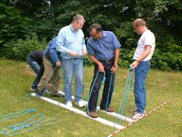 You Will Need 2 Short Planks Per Team And 2 Rope Or Cloth Slings For Each Person You Can Have A Start And F Team Building Team Building Games Building Games