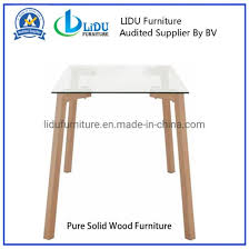 Not only are we inspired by this entire scene found at decoholic but that piece in particular is such a beautiful way to infused both function and artistic focus into your home. Best Price Glass Dining Table With Wooden Legs Large Table Wood Table China Dining Table Dining Room Set Made In China Com