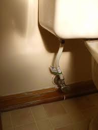 How To Fix Your Toilet S Flush Valve Seal With Photos Toilet Repair Toilet Toilet Handle