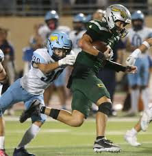 Photo Gallery: Mustangs run past the Warriors 42-28