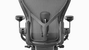 rear view of a black aeron office chair showing back support and adjustable arms office chair aeron chair herman miller aeron office chair