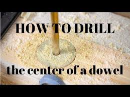 2) slide the plastic disc down the drill bit onto the shaft and glue with super glue. How To Drill A Hole In The Center Of A Dowel Youtube Dowels Drill How To Remove Glue