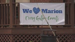 Families in Marion, Kentucky, install water tanks to make do during water  crisis