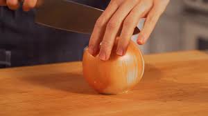 this video shows exactly how to peel and cut an onion real