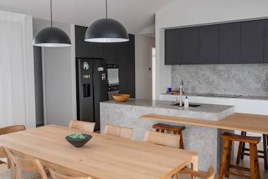 Decluttered kitchen counters create an impression of spaciousness., AI generated