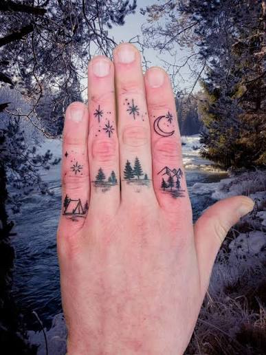 Added some more woods magic 🪄 . . . #fingertattoo #foresttattoo #camping #moontattoo