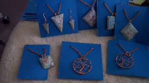 For necklaces, we created the punches on either edge of the cards. How To Make Simple Jewelry Display Cards Diy Style Tutorial Guidecentral Youtube