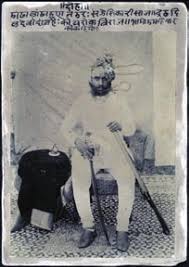 Unknown photographer, Rajput man seated with sword and gun, India,... | Download Scientific Diagram