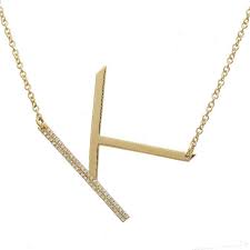 We promise you won't want to take it off! 14k Yellow Gold Sideways Large Initial Diamond Necklace Maurice S Jewelers