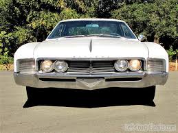 Image result for Riviera Champagne 1966 Buick