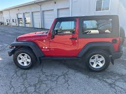 Image result for Flame Red 2009 Jeep
