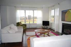 Here, the sofa floats in the middle of the room, facing the only wall where a tv could be mounted and not block the windows. How To Secretly Arrange Furniture Around The Tv