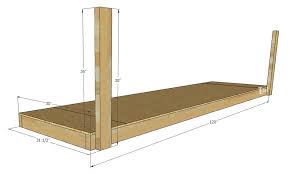 Simply cut and prepare the wood, install the ledger, install the shear plates, and put up the shelves. Overhead Garage Storage Shelf Her Tool Belt