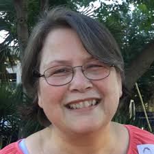 What are the identities of the dogs running loose near Rawl's fields