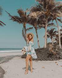 Emily Vartanian In Mexico Wearing A Dreamy Sundress And Bathing Suit Cover Up On A Tropical Beach Beach Poses Photography Genres Beach Photoshoot