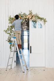 Wedding flower arrangements go beyond the basic centerpieces and bouquets. Diy Floral Doorway Arch Diy Wedding Decor 100 Layer Cake Wedding Arch Flowers Diy Wedding Arch Arch Flowers
