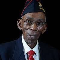 Army Veteran Frederick Carrier speaks with military