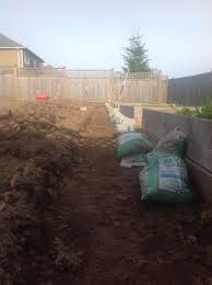 Never do this project in winter as it will make some steps incredibly difficult. Can A Retaining Wall Follow A Slope Home Improvement Stack Exchange