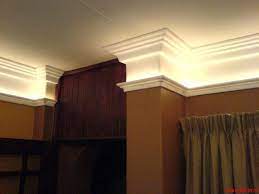 Hold the crown molding upside down and backwards so that it presses up safely against the fence of the miter saw. Crown Lighting Or Above Kitchen Counters House Design Home Decor Home Remodeling