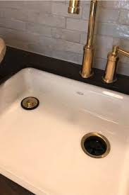 brass kitchen faucet, kohler sink