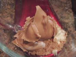 In a medium bowl, add the melted butter, pretzel crumbs, confectioners' sugar and 1 cup of the peanut butter and stir together until well combined. Garth Brooks Trisha Yearwood And Peanut Butter Chocolate Chip Cookies The Mrs With The Dishes