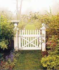 White picket fence with a gate and green lawn. 8 Picket Fence Gate Ideas In 2021 Fence Gate Gate Garden Gates